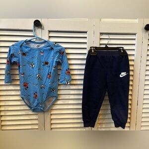 Nike Blue Bodysuit with Sports and check Print 18M